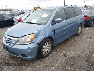 2010 Honda Odyssey EX-L with VIN 5FNRL3H64AB015029, listed as a IAAI auction lot 41962577 with 173,170 mi miles. Bid and sale history available at carsss.com. Image 2.