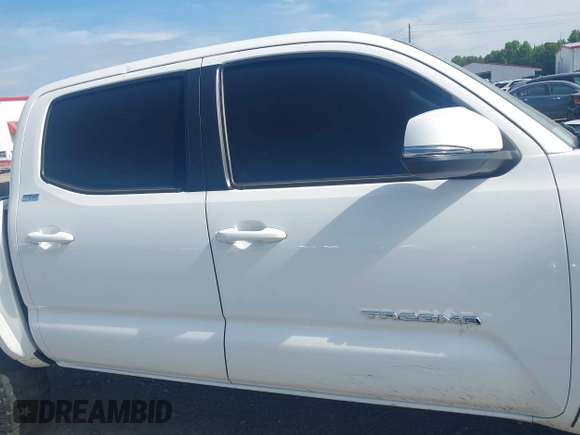 2023 Toyota Tacoma SR with VIN 3TYCZ5AN2PT112854, listed as a IAAI auction lot 42220025 with 43,657 mi miles and . Bid and sale history available at DreamBid. Image 14.