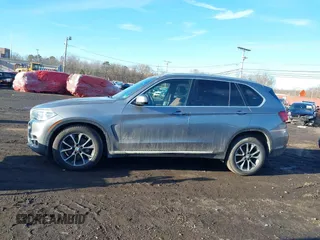 2017 BMW X5 xDrive35i z VIN 5UXKR0C51H0U53611, wystawiony jako IAAI lot #41574622 z przebiegiem 76 825 mil mil oraz . Historia ofert i sprzedaży dostępna na DreamBid. Obrazek 14.