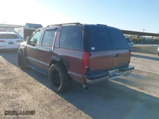 1996 Chevrolet Tahoe with VIN 1GNEK13R9TJ408499, listed as a IAAI auction lot 41308726 with 118,336 mi miles. Bid and sale history available at carsss.com. Image 6.