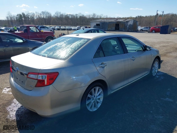2014 Toyota Camry Hybrid LE with VIN 4T1BD1FK0EU112479, listed as a IAAI auction lot 41901348 with 91,440 mi miles. Bid and sale history available at carsss.com. Image 4.
