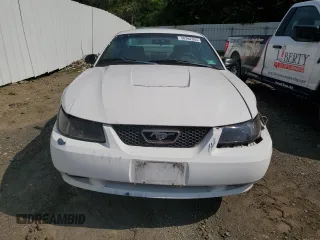 2003 Ford Mustang Standard z VIN 1FAFP40423F337129, wystawiony jako Copart lot #58982005 z przebiegiem 196 277 mil mil oraz Szkoda całkowita • Salvage title. Historia ofert i sprzedaży dostępna na DreamBid. Obrazek 5.