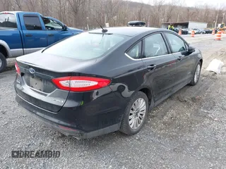 2015 Ford Fusion S Hybrid with VIN 3FA6P0UU8FR283233, listed as a IAAI auction lot 41501282 with 190,809 mi miles. Bid and sale history available at carsss.com. Image 4.