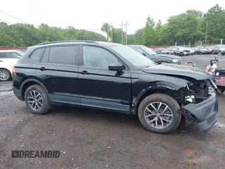 2021 Volkswagen Tiguan S z VIN 3VV0B7AX3MM031908, wystawiony jako IAAI lot #42504384 z przebiegiem 42 510 mil mil oraz . Historia ofert i sprzedaży dostępna na DreamBid. Obrazek 17.