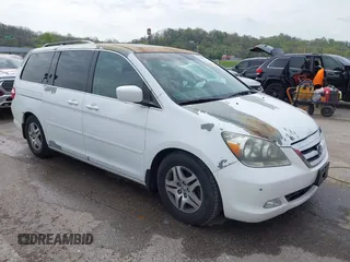 2007 Honda Odyssey Touring with VIN 5FNRL38887B081562, listed as a IAAI auction lot 42000435 with 238,287 mi miles and . Bid and sale history available at DreamBid. Image 1.