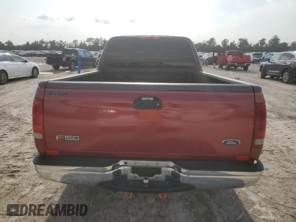2001 Ford F-150 XL with VIN 1FTRX17W71NB71934, listed as a Copart auction lot 54231605 with 257,867 mi miles and Salvage title. Bid and sale history available at DreamBid. Image 6.