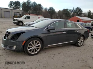 2014 Cadillac XTS Luxury z VIN 2G61N5S39E9292158, wystawiony jako Copart lot #87945195 z przebiegiem 157 487 mil mil oraz Czysty tytuł • Clean title. Historia ofert i sprzedaży dostępna na DreamBid. Obrazek 1.