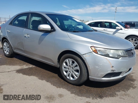 2010 Kia Forte EX with VIN KNAFU4A29A5195670, listed as a IAAI auction lot 42075961 with 160,648 mi miles. Bid and sale history available at carsss.com. Image 1.