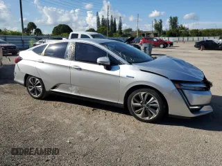 2018 Honda Clarity Plug-In Hybrid with VIN JHMZC5F12JC015478, listed as a Copart auction lot 73971644 with 64,031 mi miles and Clean Title. Bid and sale history available at carsss.com. Image 4.