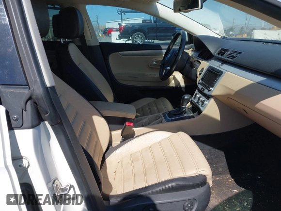 2013 Volkswagen CC Sport Plus с VIN WVWBP7AN7DE561439, выставлен на аукционе IAAI как лот 42479112 с пробегом 142 037 миль миль и . История ставок и продаж доступна на DreamBid. Изображение 5.