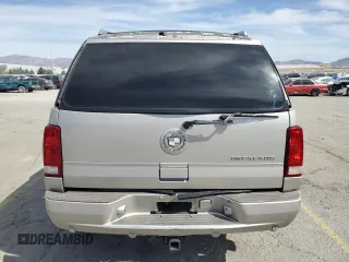 2004 Cadillac Escalade z VIN 1GYEC63T44R235759, wystawiony jako Copart lot #53166755 z przebiegiem 212 034 mil mil oraz Szkody całkowita. Historia ofert i sprzedaży dostępna na DreamBid. Obrazek 6.