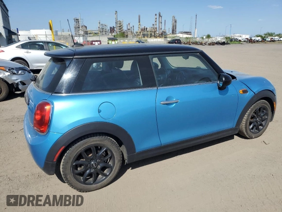2017 MINI Hardtop Cooper with VIN WMWXP5C33H2G60921, listed as a Copart auction lot 58139295 with 94,599 mi miles and Salvage title. Bid and sale history available at DreamBid. Image 3.