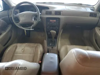 1999 Toyota Camry LE z VIN JT2BG22K3X0317823, wystawiony jako Copart lot #58203965 z przebiegiem 167 587 mil mil oraz Szkoda całkowita • Salvage title. Historia ofert i sprzedaży dostępna na DreamBid. Obrazek 8.