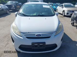 2013 Ford Fiesta S with VIN 3FADP4AJ7DM184180, listed as a IAAI auction lot 42632804 with 176,729 mi miles and . Bid and sale history available at DreamBid. Image 6.