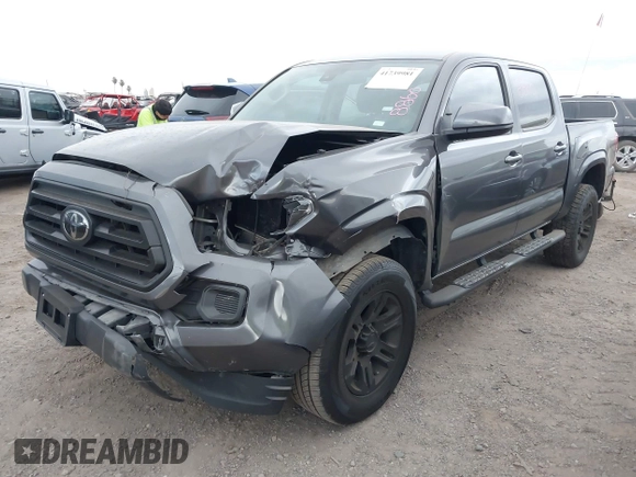 2022 Toyota Tacoma SR with VIN 3TYAX5GN8NT066318, listed as a IAAI auction lot 41739981 with 50,186 mi miles and . Bid and sale history available at DreamBid. Image 2.