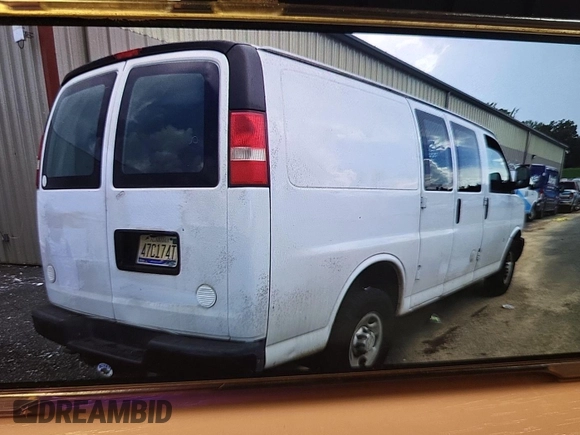 2014 Chevrolet Express Cargo with VIN 1GCWGFCG4E1148722, listed as a IAAI auction lot 42785369 with 188,945 mi miles and . Bid and sale history available at DreamBid. Image 6.