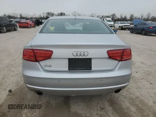 2013 Audi A8 3.0L z VIN WAUAGAFD6DN006892, wystawiony jako Copart lot #87917725 z przebiegiem 149 501 mil mil oraz Szkoda całkowita • Salvage title. Historia ofert i sprzedaży dostępna na DreamBid. Obrazek 6.