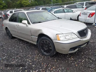 2004 Acura RL w/Navigation System z VIN JH4KA96684C005312, wystawiony jako IAAI lot #42523137 z przebiegiem Nie podano mil oraz . Historia ofert i sprzedaży dostępna na DreamBid. Obrazek 1.