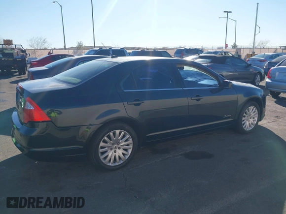 2010 Ford Fusion Hybrid with VIN 3FADP0L32AR149911, listed as a IAAI auction lot 41636037 with 148,431 mi miles. Bid and sale history available at carsss.com. Image 19.