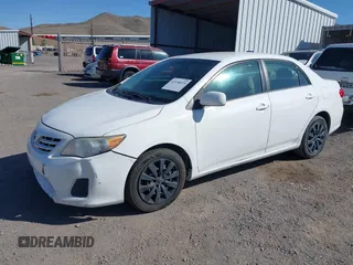 2013 Toyota Corolla L with VIN 5YFBU4EE2DP125215, listed as a IAAI auction lot 42158224 with 196,550 mi miles. Bid and sale history available at carsss.com. Image 2.