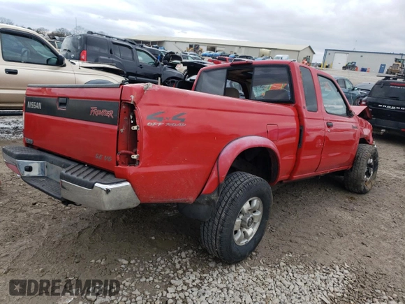 1999 Nissan Frontier XE with VIN 1N6ED26Y4XC313142, listed as a Copart auction lot 85777354 with 122,822 mi miles and Salvage title. Bid and sale history available at DreamBid. Image 3.