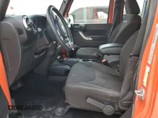 2015 Jeep Wrangler Unlimited Rubicon with VIN 1C4BJWFG9FL654550, listed as a Copart auction lot 49306965 with 64,911 mi miles and Salvage Title. Bid and sale history available at carsss.com. Image 7.