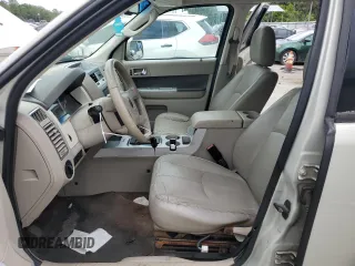 2009 Mercury Mariner Premier with VIN 4M2CU87GX9KJ20726, listed as a Copart auction lot 58690305 with 174,698 mi miles and Salvage title. Bid and sale history available at DreamBid. Image 7.