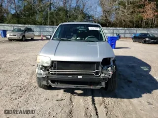 2003 Ford Escape XLT Popular with VIN 1FMYU03163KB45334, listed as a Copart auction lot 86947804 with 121,234 mi miles and Salvage Title. Bid and sale history available at carsss.com. Image 11.
