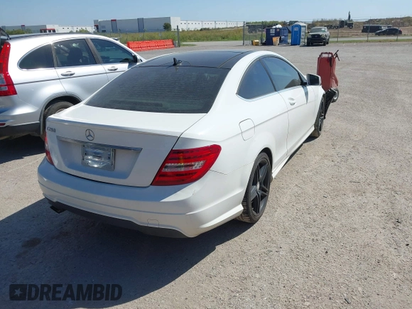 2015 Mercedes-Benz C-Class C 250 with VIN WDDGJ4HB1FG403788, listed as a IAAI auction lot 40495537 with 129,832 mi miles. Bid and sale history available at carsss.com. Image 4.