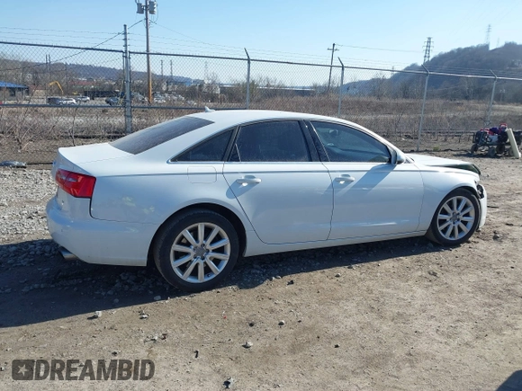 2015 Audi A6 Premium Plus z VIN WAUGFAFC4FN016103, wystawiony jako IAAI lot #41774479 z przebiegiem 125 412 mil mil oraz . Historia ofert i sprzedaży dostępna na DreamBid. Obrazek 14.