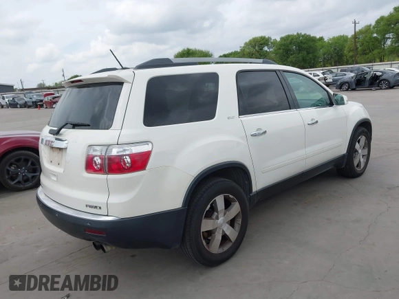 2011 GMC Acadia SLT1 with VIN 1GKKVRED3BJ144346, listed as a IAAI auction lot 41879564 with 311,658 mi miles and . Bid and sale history available at DreamBid. Image 4.