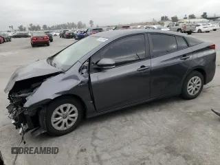 2021 Toyota Prius L Eco with VIN JTDKAMFU8M3130779, listed as a Copart auction lot 56452395 with 86,094 mi miles and Salvage title. Bid and sale history available at DreamBid. Image 1.
