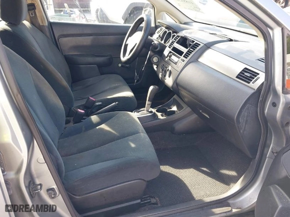 2010 Nissan Versa 1.8 S with VIN 3N1BC1CP9AL385466, listed as a IAAI auction lot 41884324 with 140,753 mi miles. Bid and sale history available at carsss.com. Image 5.