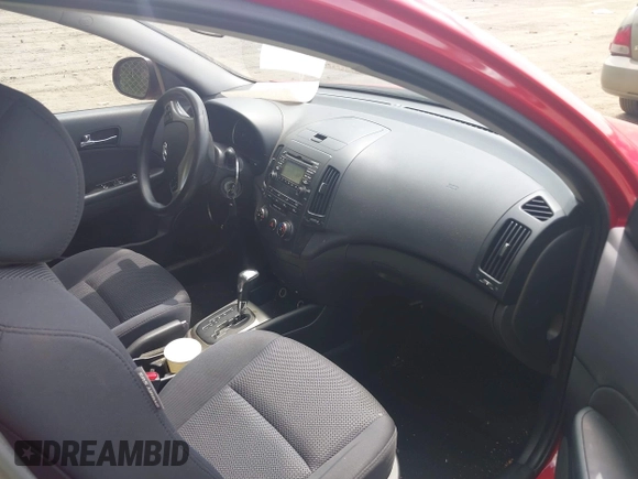 2010 Hyundai Elantra Touring SE with VIN KMHDC8AE2AU075841, listed as a IAAI auction lot 40128211 with 173,541 mi miles. Bid and sale history available at carsss.com. Image 5.