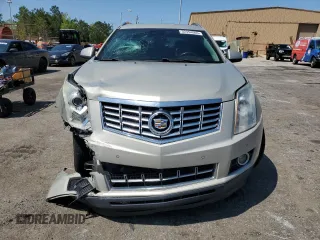 2015 Cadillac SRX Performance Collection z VIN 3GYFNCE31FS638057, wystawiony jako Copart lot #52454065 z przebiegiem 198 417 mil mil oraz Czysty tytuł • Clean title. Historia ofert i sprzedaży dostępna na DreamBid. Obrazek 5.