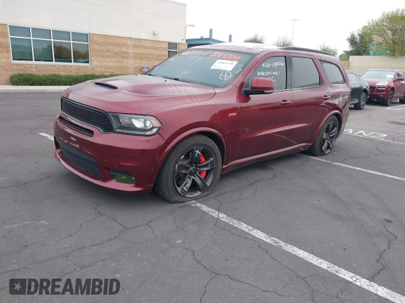 2018 Dodge Durango SRT with VIN 1C4SDJGJ5JC291287, listed as a IAAI auction lot 41862178 with 70,294 mi miles and . Bid and sale history available at DreamBid. Image 2.