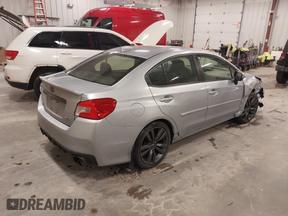 2016 Subaru WRX Premium with VIN JF1VA1E61G9807306, listed as a IAAI auction lot 41853364 with 125,831 mi miles and . Bid and sale history available at DreamBid. Image 4.