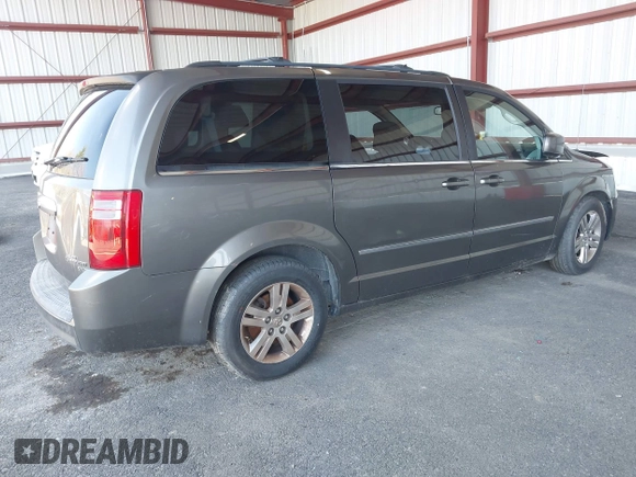 2010 Dodge Grand Caravan SXT with VIN 2D4RN5DX6AR316624, listed as a IAAI auction lot 41943314 with 132,563 mi miles and . Bid and sale history available at DreamBid. Image 4.