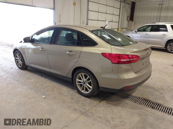 2016 Ford Focus SE z VIN 1FADP3F23GL277537, wystawiony jako IAAI lot #41603658 z przebiegiem 107 115 mil mil oraz . Historia ofert i sprzedaży dostępna na DreamBid. Obrazek 3.