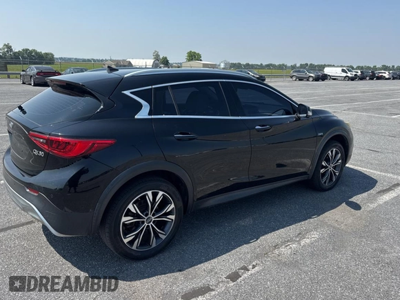 2018 Infiniti QX30 Premium with VIN SJKCH5CR4JA044802, listed as a Copart auction lot 59876905 with 89,177 mi miles and Clean title. Bid and sale history available at DreamBid. Image 4.