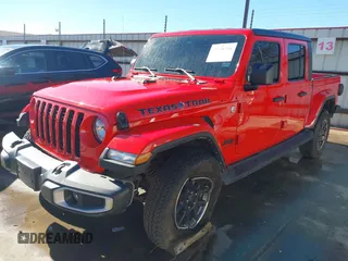 2021 Jeep Gladiator Freedom z VIN 1C6HJTAG7ML609661, wystawiony jako IAAI lot #41410756 z przebiegiem 44 636 mil mil oraz . Historia ofert i sprzedaży dostępna na DreamBid. Obrazek 19.