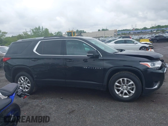 2018 Chevrolet Traverse LT Cloth z VIN 1GNEVGKWXJJ213302, wystawiony jako IAAI lot #42298743 z przebiegiem 138 282 mil mil oraz . Historia ofert i sprzedaży dostępna na DreamBid. Obrazek 13.