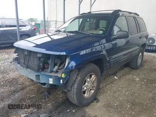 2000 Jeep Grand Cherokee Limited with VIN 1J4GW58S9YC347699, listed as a IAAI auction lot 42545373 with 118,566 mi miles and . Bid and sale history available at DreamBid. Image 18.