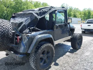 2003 Jeep Wrangler Sport z VIN 1J4FA49S53P317779, wystawiony jako IAAI lot #42388780 z przebiegiem Nie podano mil oraz . Historia ofert i sprzedaży dostępna na DreamBid. Obrazek 4.