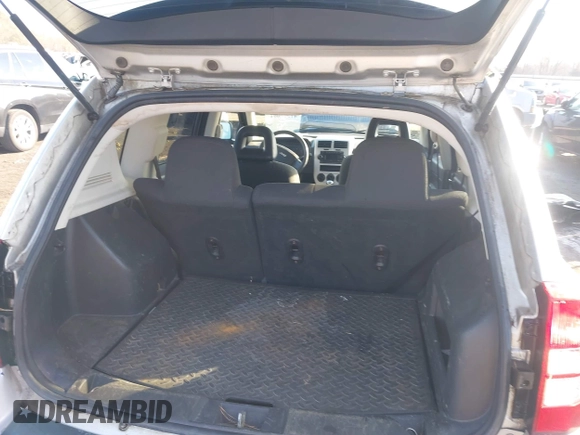 2008 Jeep Compass Sport with VIN 1J8FT47098D665734, listed as a IAAI auction lot 41561801 with 169,446 mi miles. Bid and sale history available at carsss.com. Image 8.