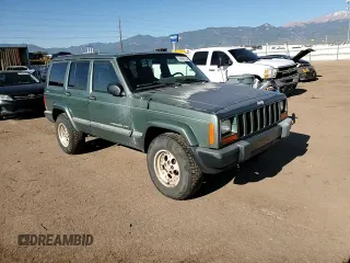 2000 Jeep Cherokee with VIN 1J4FF48S0YL198802, listed as a Copart auction lot 59996915 with 249,756 mi miles and Salvage title. Bid and sale history available at DreamBid. Image 13.