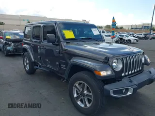 2021 Jeep Wrangler Unlimited Sahara z VIN 1C4HJXEN4MW503014, wystawiony jako IAAI lot #41900234 z przebiegiem 16 444 mil mil oraz . Historia ofert i sprzedaży dostępna na DreamBid. Obrazek 1.
