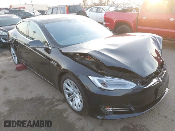 2016 Tesla Model S 90D z VIN 5YJSA1E26GF156108, wystawiony jako IAAI lot #41453148 z przebiegiem 74 717 mil mil oraz . Historia ofert i sprzedaży dostępna na DreamBid. Obrazek 1.
