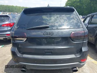 2014 Jeep Grand Cherokee Limited with VIN 1C4RJFBG3EC545861, listed as a IAAI auction lot 42216743 with 160,000 mi miles and . Bid and sale history available at DreamBid. Image 16.