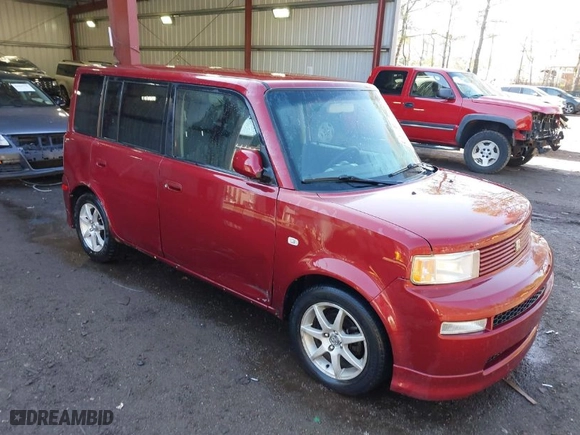 2006 Scion xB with VIN JTLKT324764111149, listed as a IAAI auction lot 41876675 with 243223 miles. Bid and sale history available at carsss.com. Image 1.